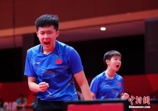 資料圖：雅加達(dá)亞運(yùn)會(huì)，王楚欽/孫穎莎奪得混雙冠軍。 <a target='_blank' href='/'>中新社</a>記者 劉關(guān)關(guān) 攝