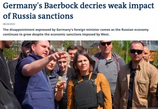 △“德國(guó)之聲”網(wǎng)站報(bào)道截圖（題圖中間為貝爾伯克）