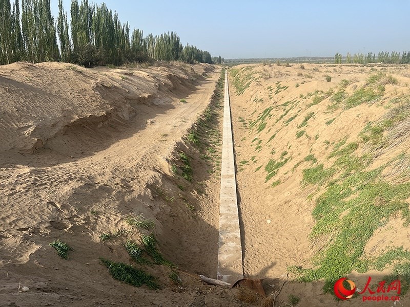 斗渠改造后，大大提高了輸水效率。人民網(wǎng)記者 常雪梅攝