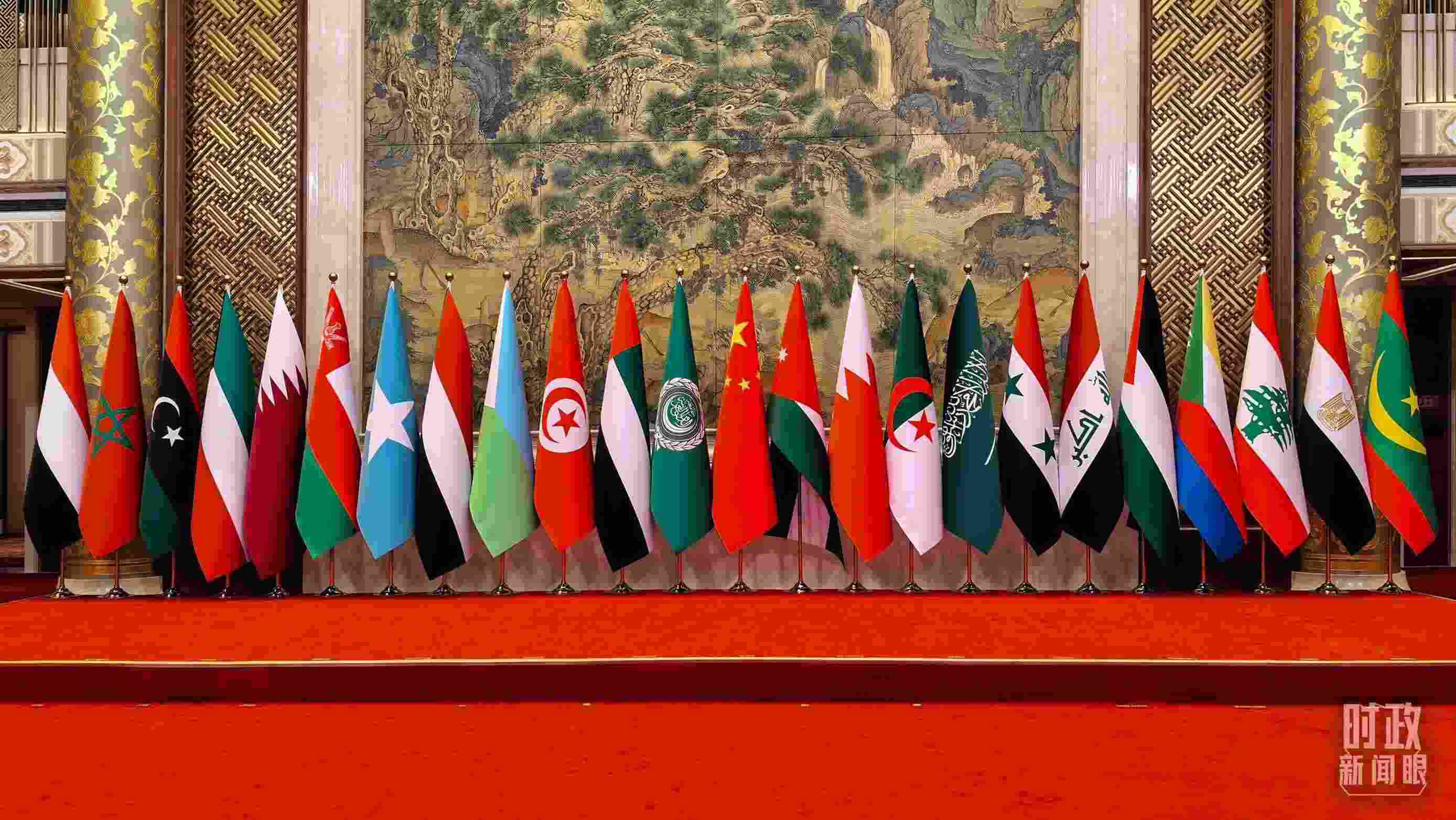 △會議現(xiàn)場的集體合影區(qū)。（總臺央廣記者潘毅拍攝）