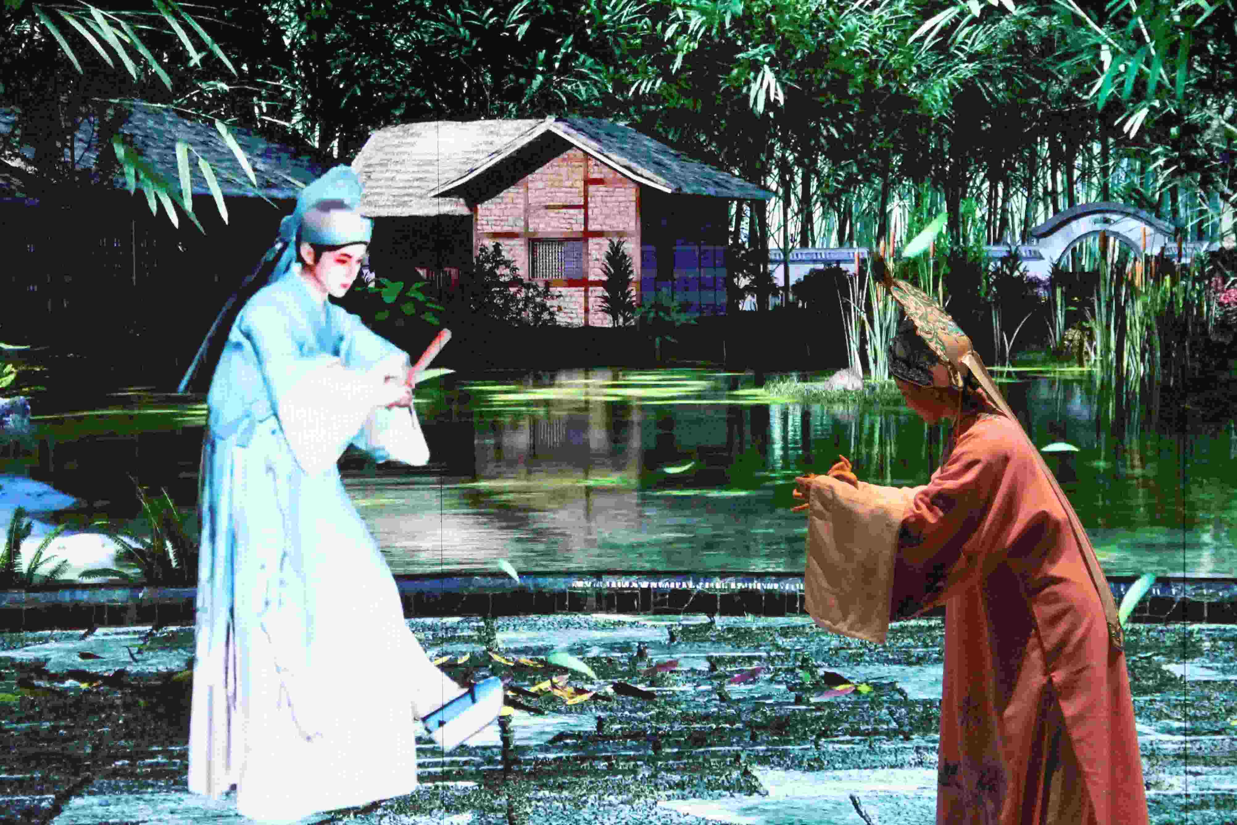 真人演員與虛擬人演員在“元啟金陵”南京數(shù)字文化客廳出演《梁山伯與祝英臺(tái)》經(jīng)典選段。受訪者供圖